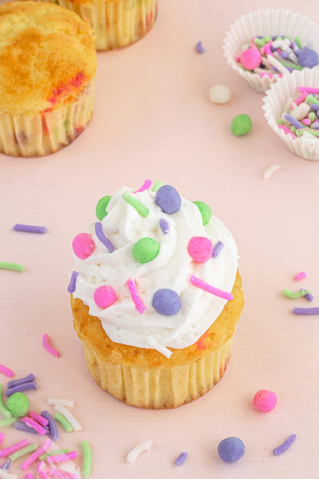 services-04 Birthday funfettie cupcake with white whipped topping and soft pastel sprinkles & pearls. Developed for food bloggers who’s readers love diy cake decorating, sprinkles, chocolate, and modeling fondant. Check out my bio for more professionally developed and tested recipes for food bloggers.