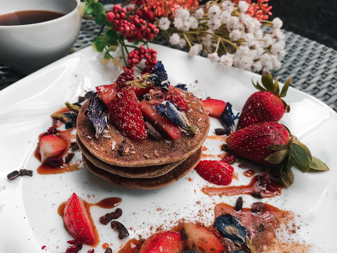 three-pancakes-topped-with-berries-gjbbz-n-k4